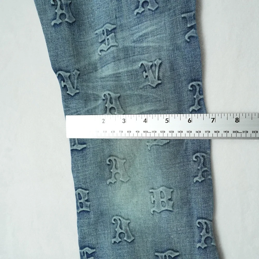 Valabasas Mens Monogram Embossed Carpenter Stacked Flare Jeans Blue Size 30